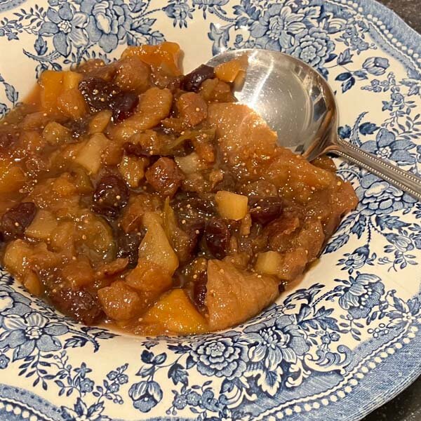 dried fruit compote served in a blue bowl