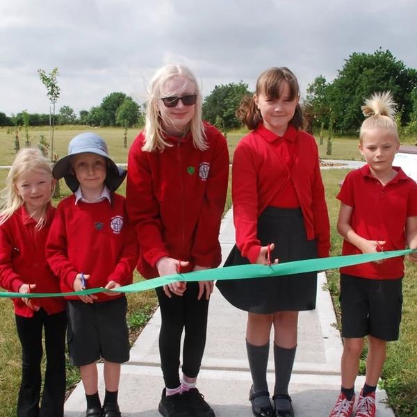 Pupils of Tollesbury School open TCP Community Orchard