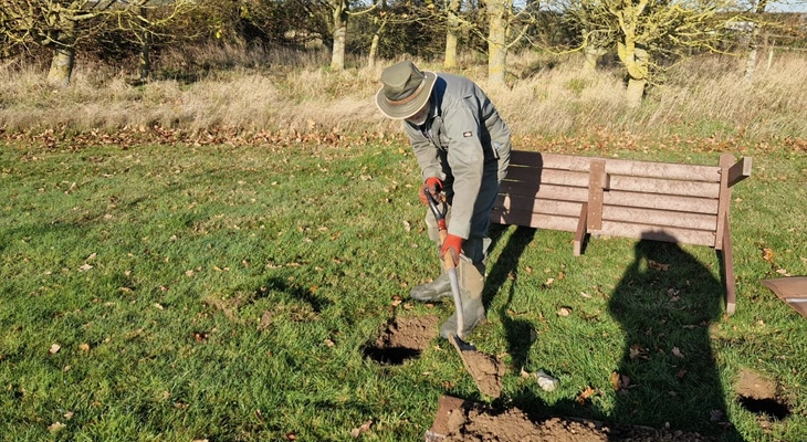 Jonathan installing benches at Tollesbury Community Orchard for TCP