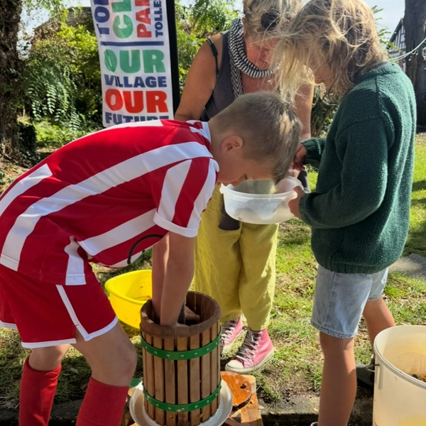Hand pressing fruit for TCP Juice your fruit, Tollesbury